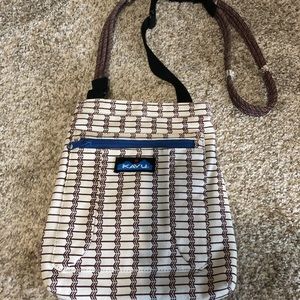Kavu keep along bag. Colors are maroon and blue.